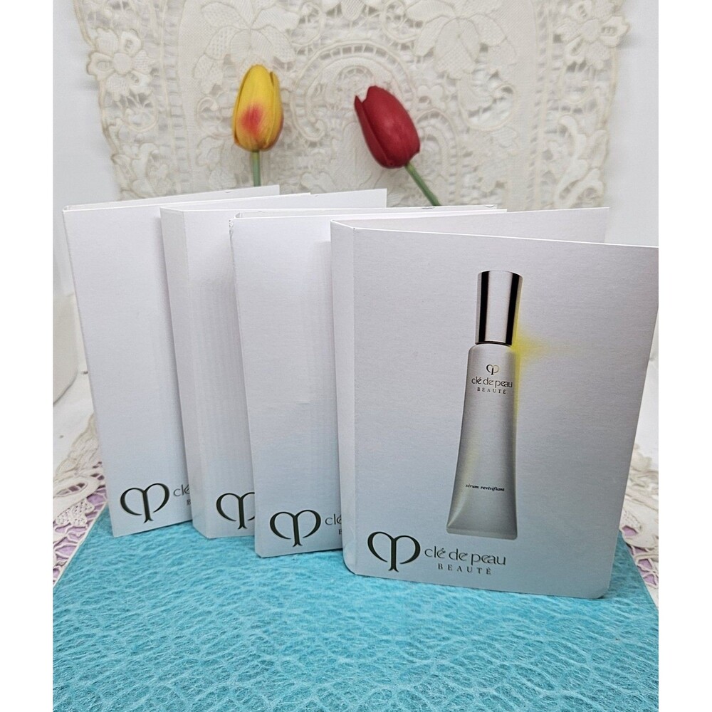 SET OF 4 CLE DE PEAU BEAUTE INTENSIVE FACIAL CONTOUR SERUM 4 ML .13 OZ EACH NIB